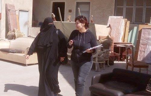 بالصور.. منتقبة داخل الكنيسة للأسر القادمة من العريش: "هعملكوا عدسبالصور.. منتقبة داخل الكنيسة للأسر القادمة من العريش: "هعملكوا عدس عشان الصيام"  عشان الصيام" 